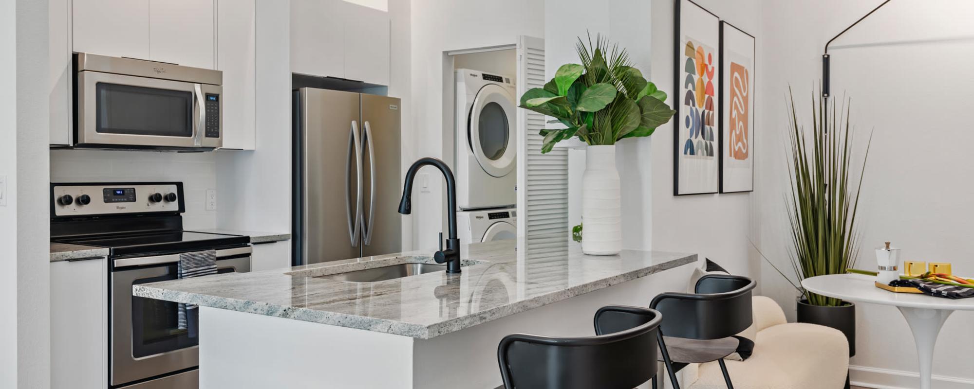 Kitchen with an island at Cordoba in Doral, Florida