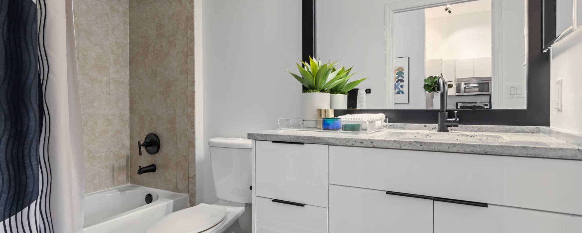 Bathroom with a shower and bathtub at Cordoba in Doral, Florida