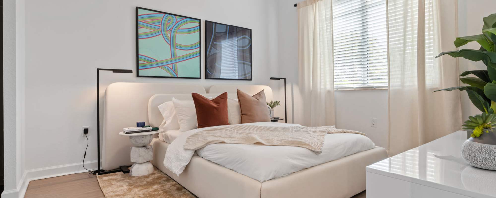 Beautiful bedroom with a bright window at Cordoba in Doral, Florida