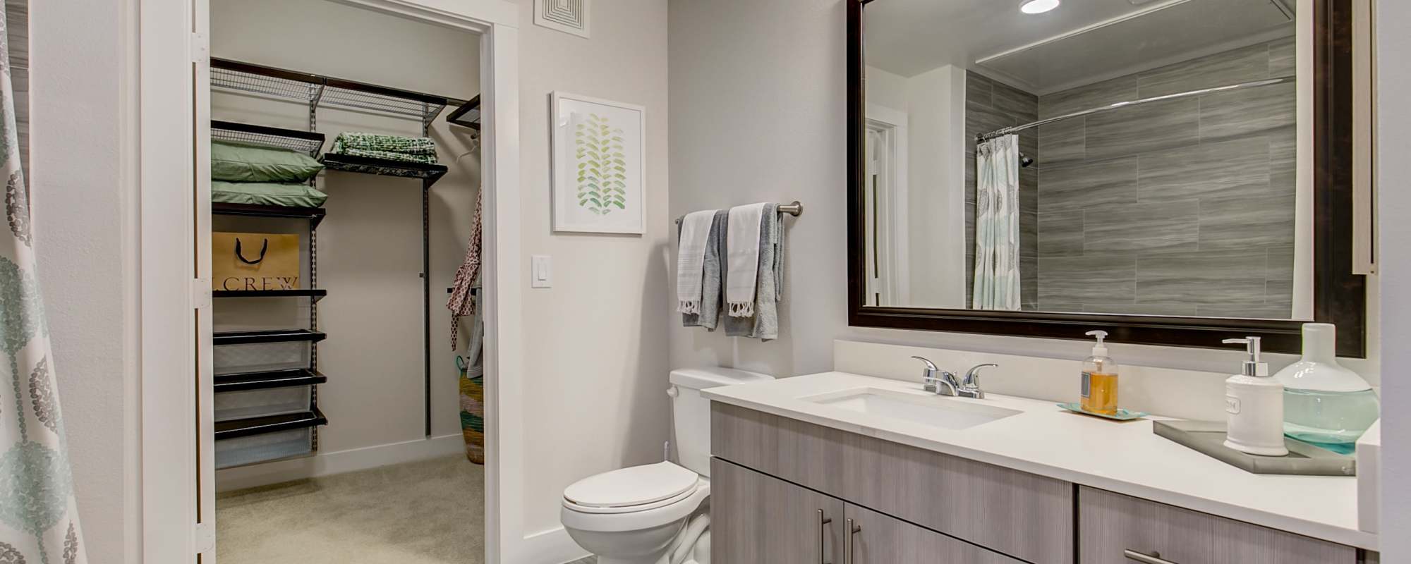 Walk-in closet inside the apartment bathroom at Factory Design District in Dallas,Texas