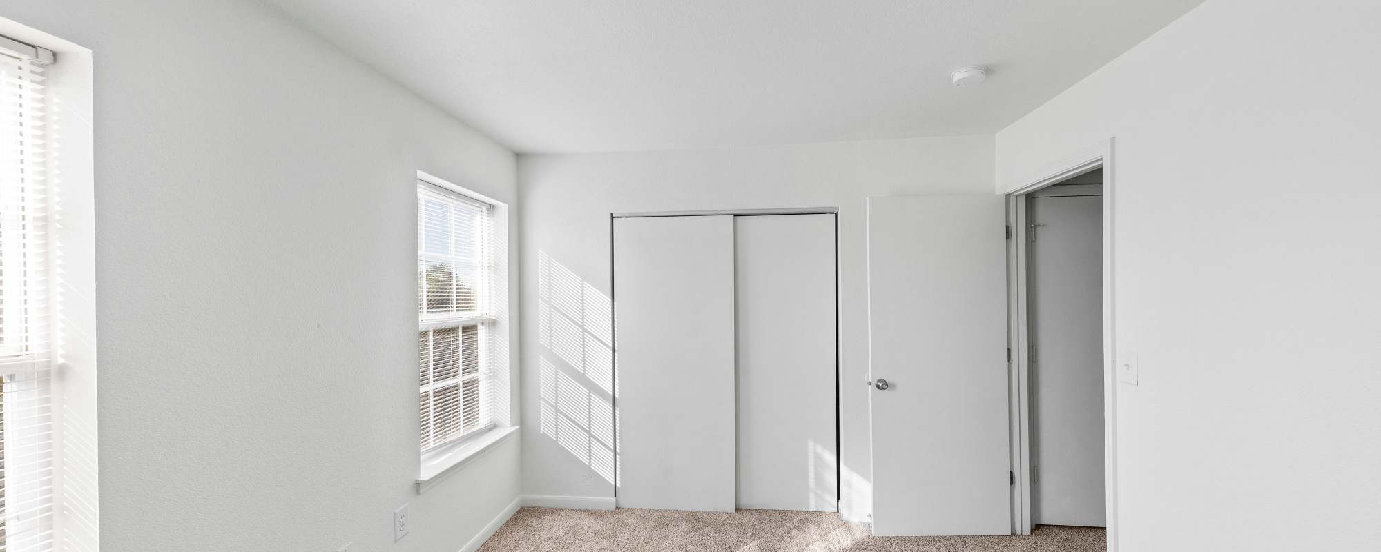 Empty bedroom with closet at Tyler's Creek Townhomes in Fairfield, Ohio