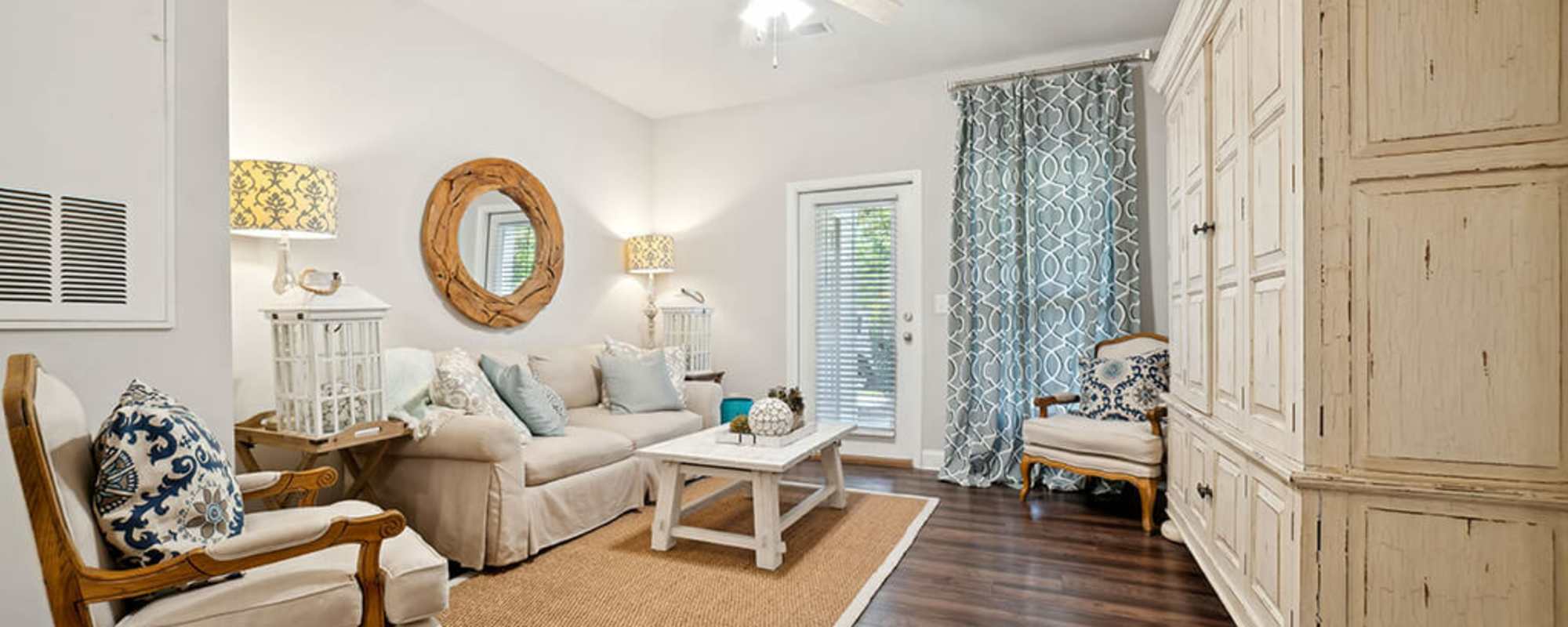 Spacious living room at The Apartments at Shade Tree in Johns Island, South Carolina