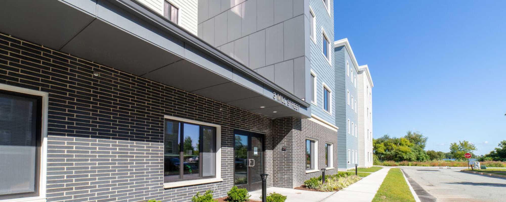 Exterior view of the apartment building at Solara in Tiverton, Rhode Island