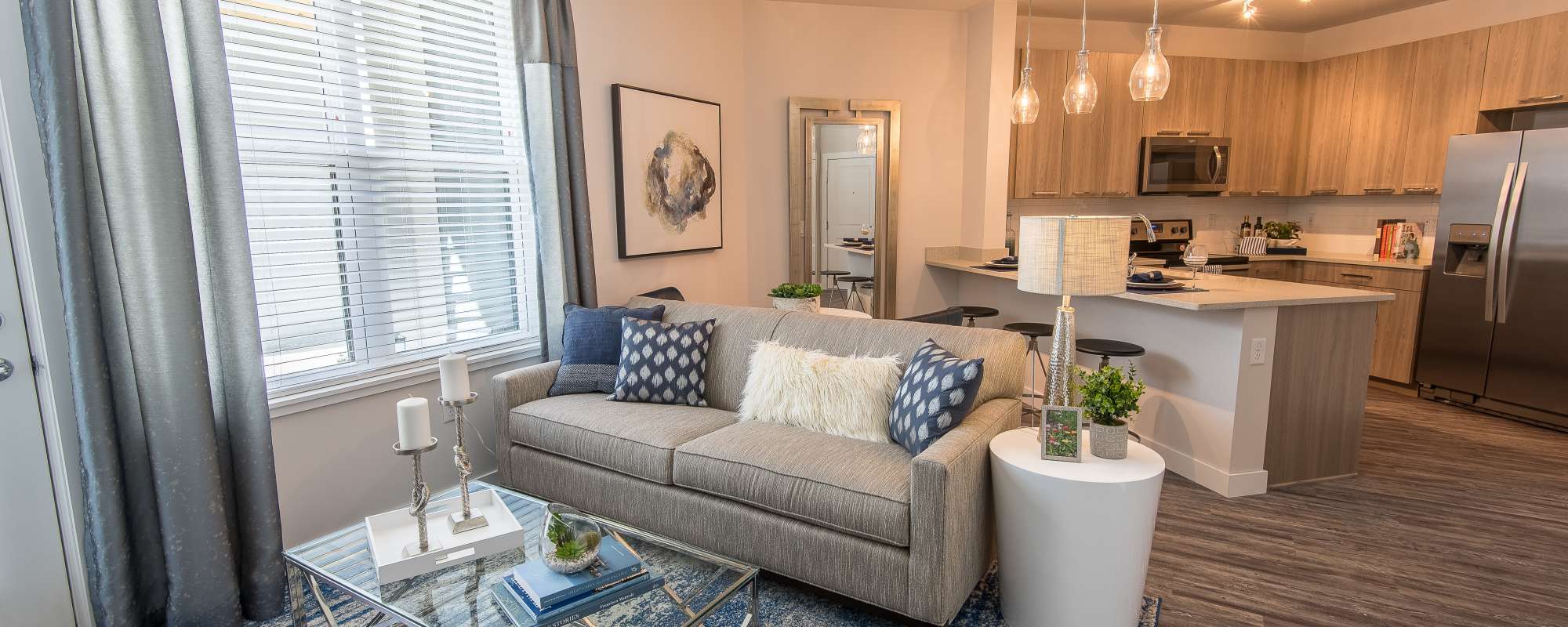 Cozy living room space near the kitchen bar at Mayfair Reserve in Wauwatosa, Wisconsin