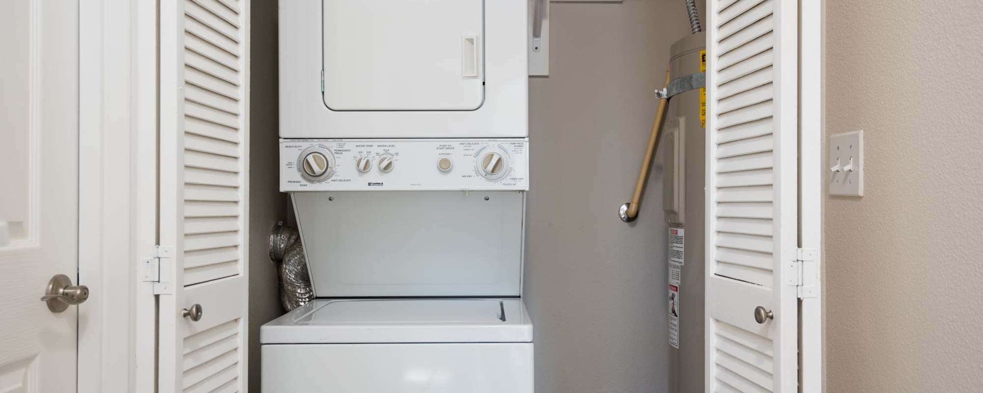 Stack washer and dryer at Chinook Way Apartments in Fairview, Oregon