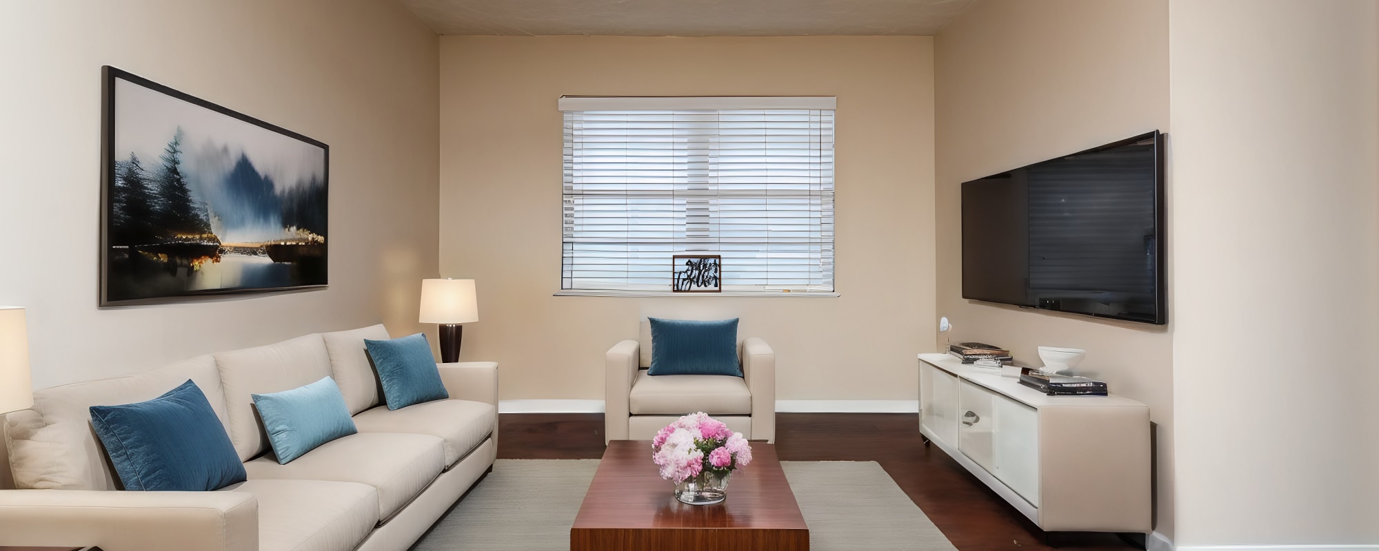 Spacious living room with large couch, flat screen television and large window at Northgate Square Apartments in Bossier City, Louisiana
