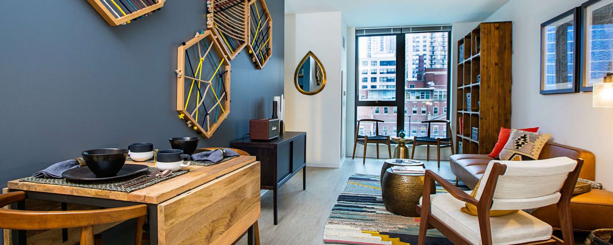 Living room with accent wall at Exhibit On Superior in Chicago, Illinois