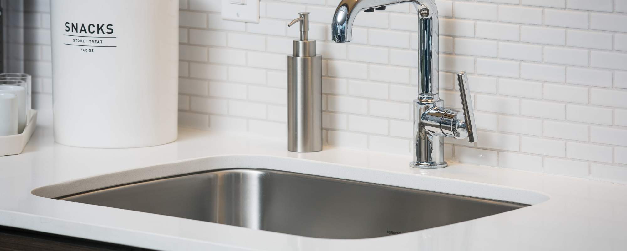 Close up of the stainless-steel sink at Exhibit On Superior in Chicago, Illinois