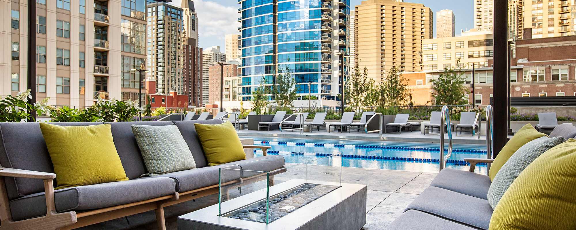 Lounge area by the pool at Exhibit On Superior in Chicago, Illinois