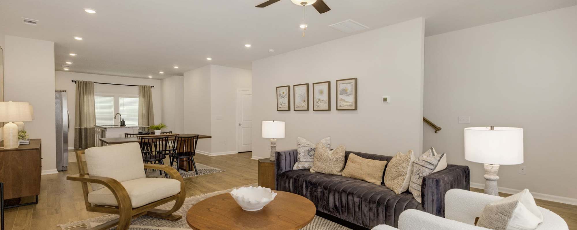 Furnished Living room and dining area The Courts at Maverick Yards in Mauldin, South Carolina