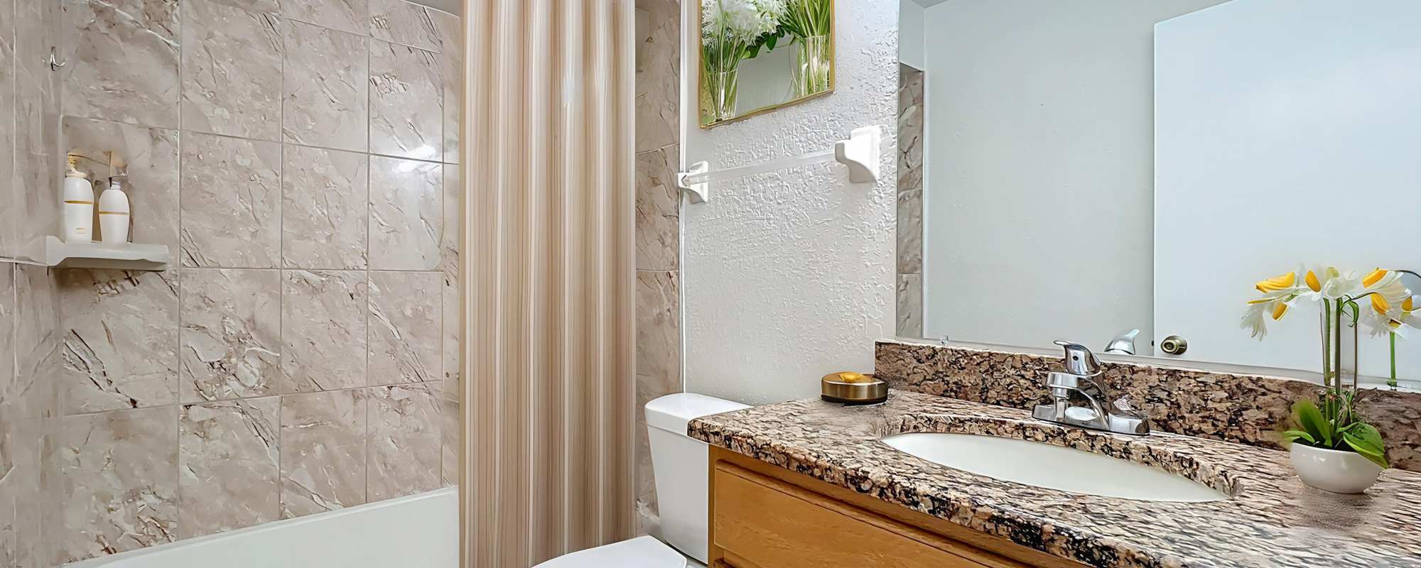 Well-lit, aesthetically pleasing bathroom at Images Condominiums in Kissimmee, Florida