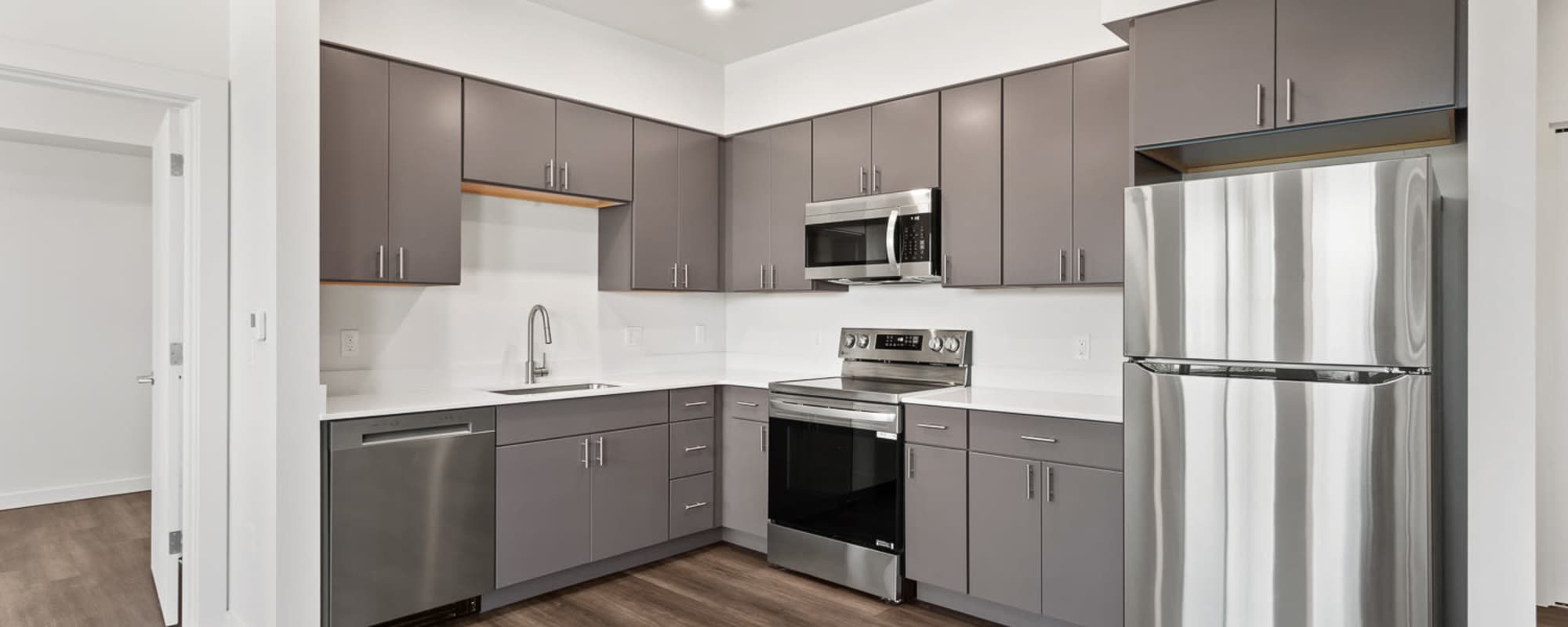 Kitchen With Stainless steel appliances.