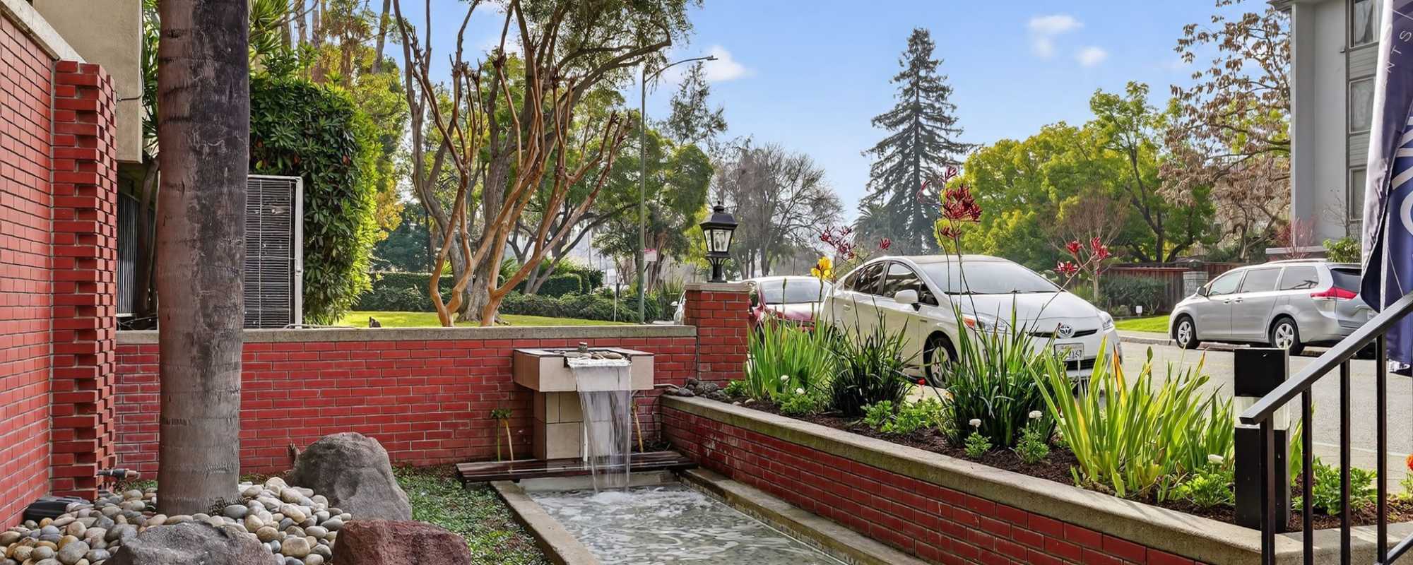Exterior of the building  with fountain at Fayette Arms Apartments in Mountain View, California,  