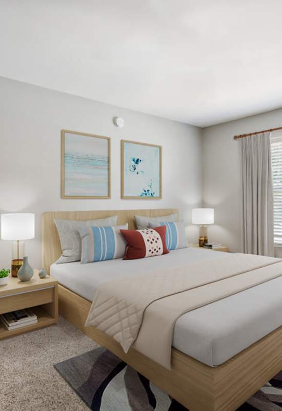Bedroom with plush carpeting at Creekside in San Angelo, Texas