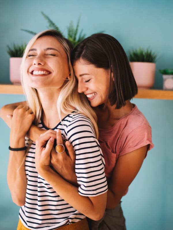 Women embracing each other at The Kendry in Charlotte, North Carolina