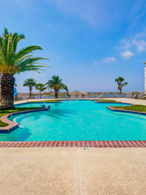 Beautiful sky and large spacious pool at Harborside Apartment Homes in Slidell, Louisiana