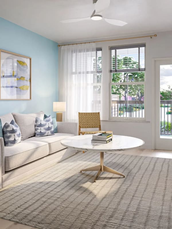 Modern bedroom with wood style flooring at Elevate Navarre in Navarre, Florida
