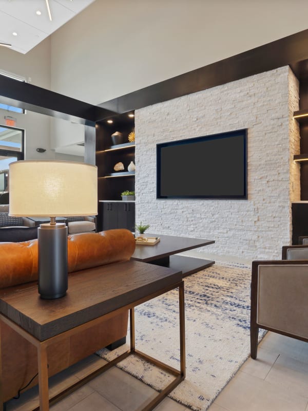 Community center with a large tv on the wall at Seasons at Franklin in Franklin, Wisconsin