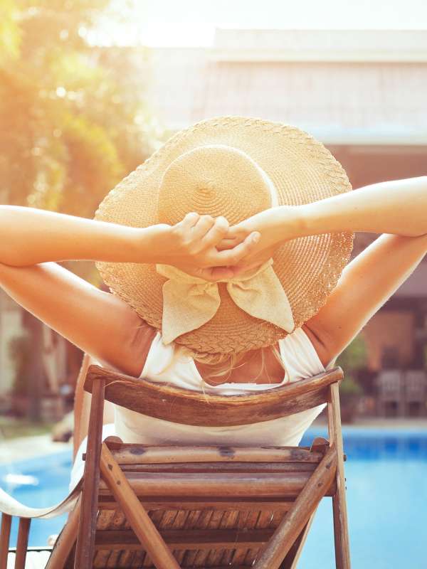 Resident relaxing by our swimming pool at Topaz in San Diego, California