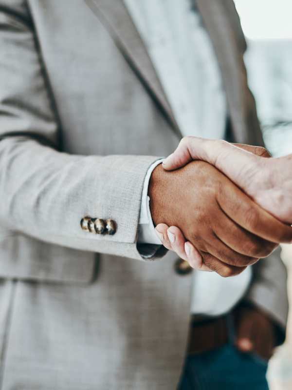 Team members shaking hands at Peters Residential in Culver City, California