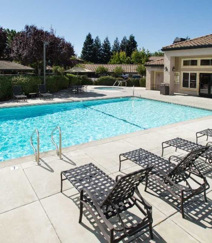 Resort-style swimming pool at La Vina Apartments in Livermore, California