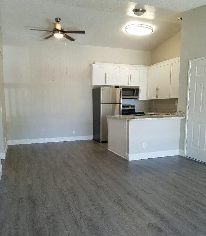 Upgraded kitchen and dining area in Redlands Lawn and Tennis Club apartment
