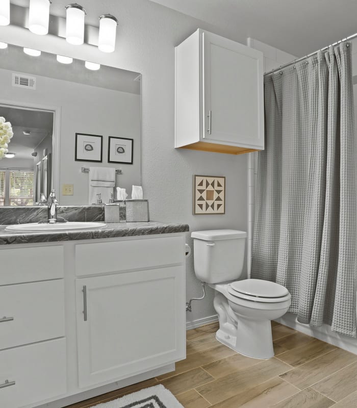 Bathroom with tile flooring at Scissortail Crossing Apartments in Broken Arrow, Oklahoma