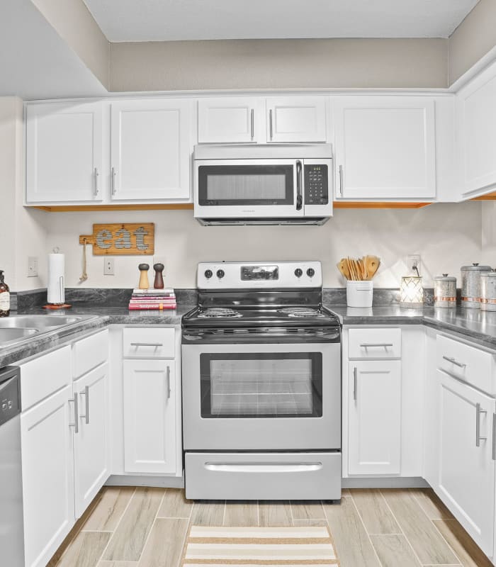 Kitchen at Cottages at Tallgrass Point Apartments in Owasso, Oklahoma