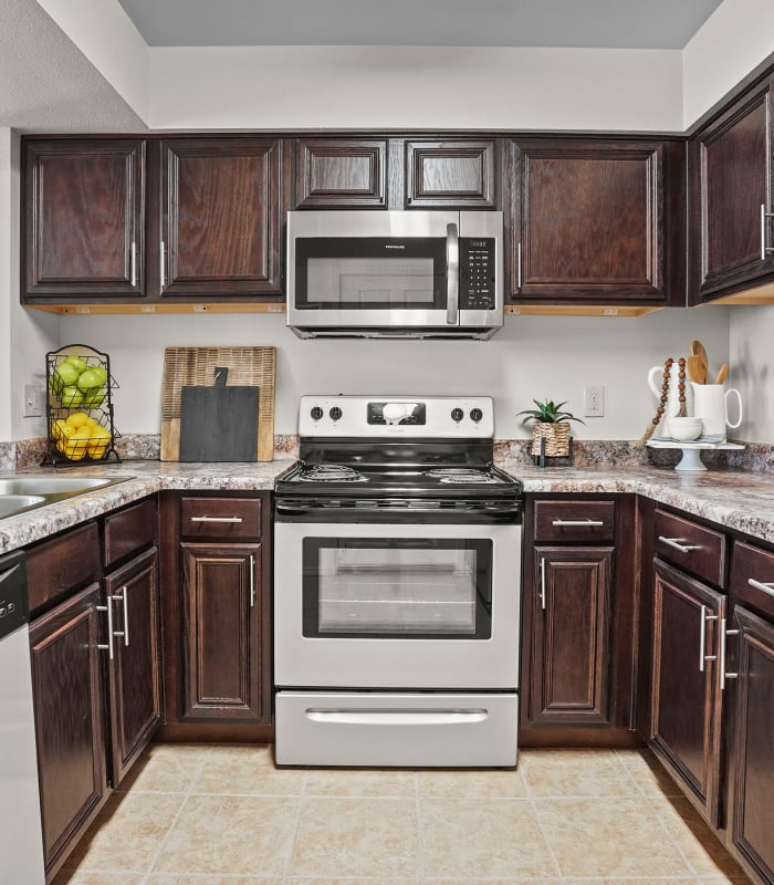 the Kitchen with granite countertops at Park at Tuscany in Oklahoma City, Oklahoma