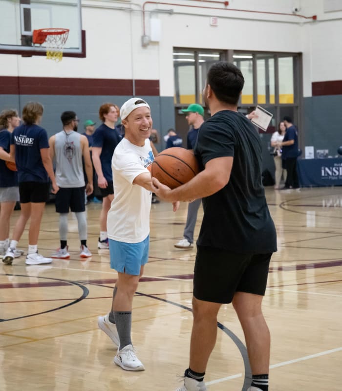 Volunteers enjoying a game of basketball at an event at Mark-Taylor in Scottsdale, Arizona