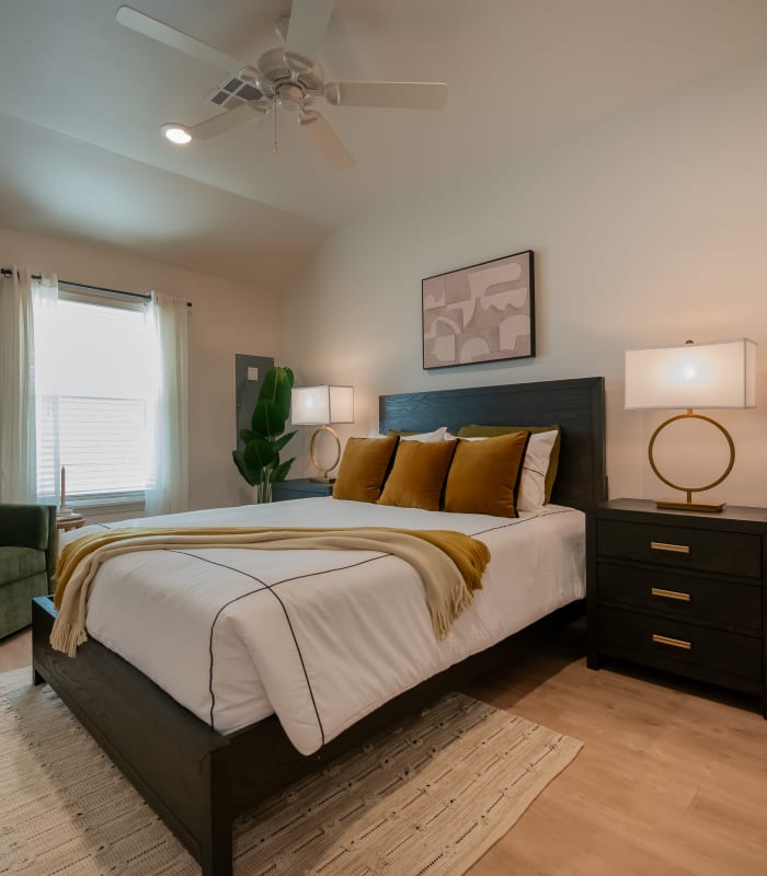 Bright bedroom with window at Chisholm Pointe in Oklahoma City, Oklahoma