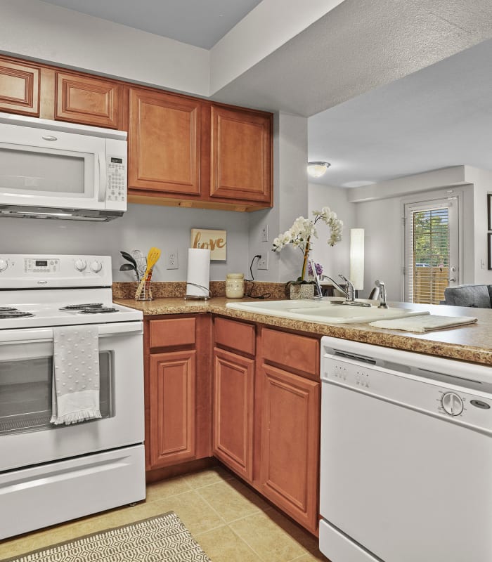 The Kitchen with granite countertops at Prairie Springs in Oklahoma City, Oklahoma