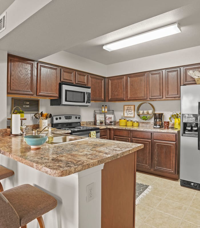 Kitchen with granite countertops at Tuscany Place in Lubbock, Texas