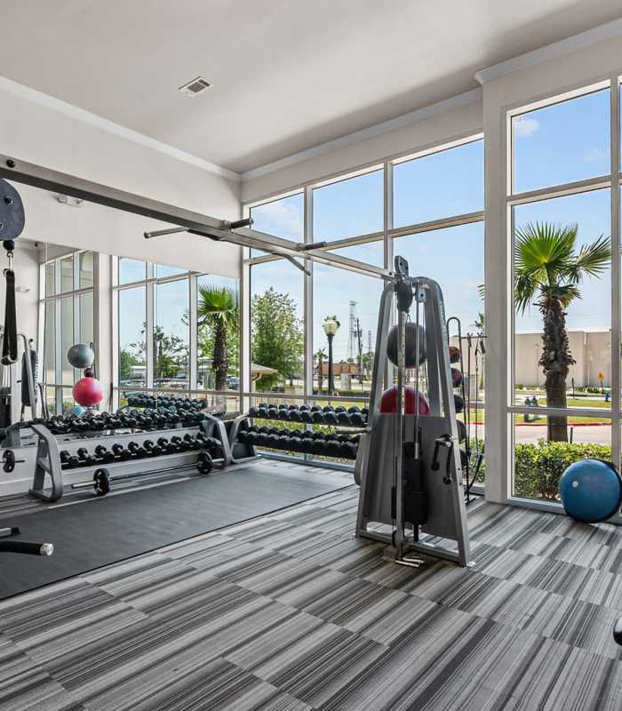 Fitness center at Towers Of Seabrook in Seabrook, Texas