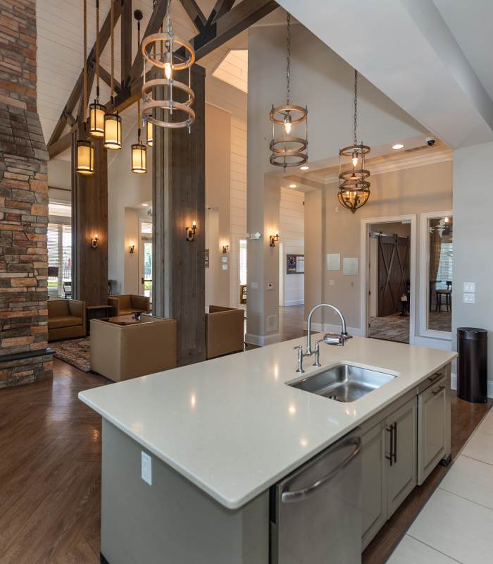 Clubhouse Kitchen Island with Sink at Red Knot at Edinburgh in Chesapeake, Virginia.