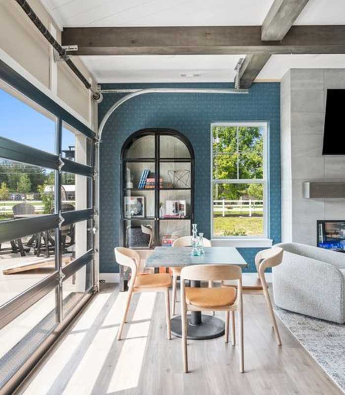 Interior of future clubhouse - sun filled room with see-through garage