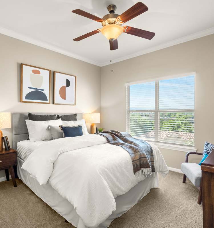 Bedroom with a ceiling fan at Estancia at Ridgeview Ranch