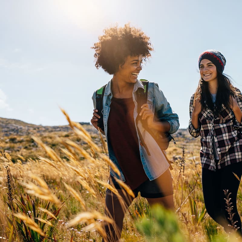 Friends going on a nice hike near Harvest Station Apartments in Broomfield, Colorado