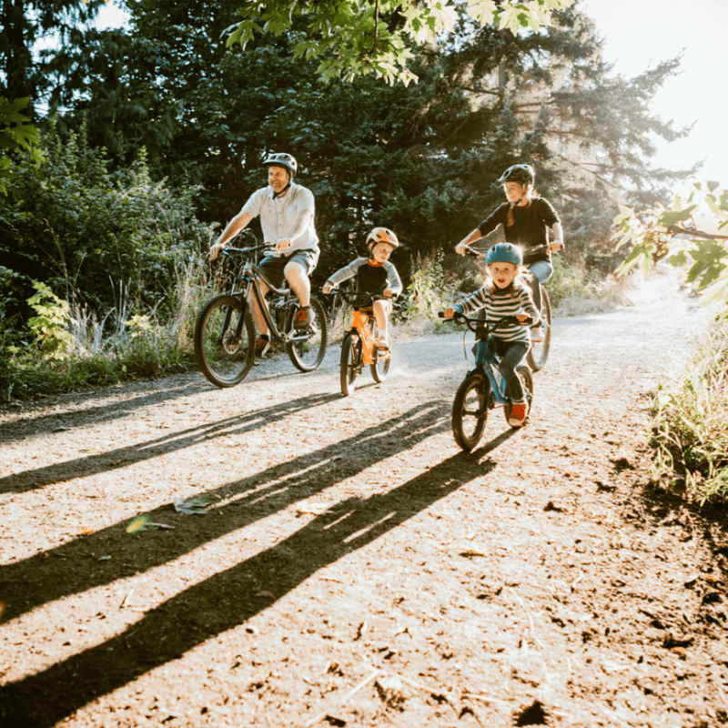 Family out on a nice bike ride near Harvest Station Apartments in Broomfield, Colorado