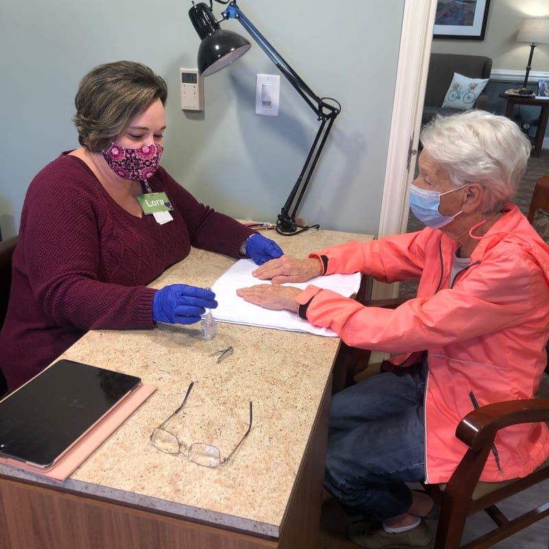 Resident getting her nails painted at The Florence Presbyterian Community in Florence, South Carolina