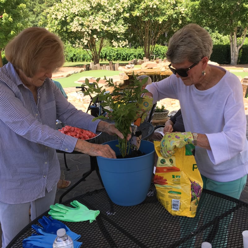 residents potting plants at The Clinton Presbyterian Community in Clinton, South Carolina