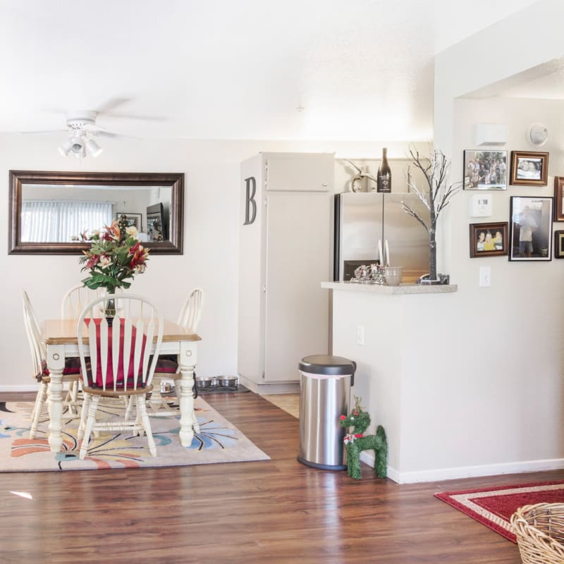 Apartment kitchen dining room combo at Woodpark Apartments in Aliso Viejo, California