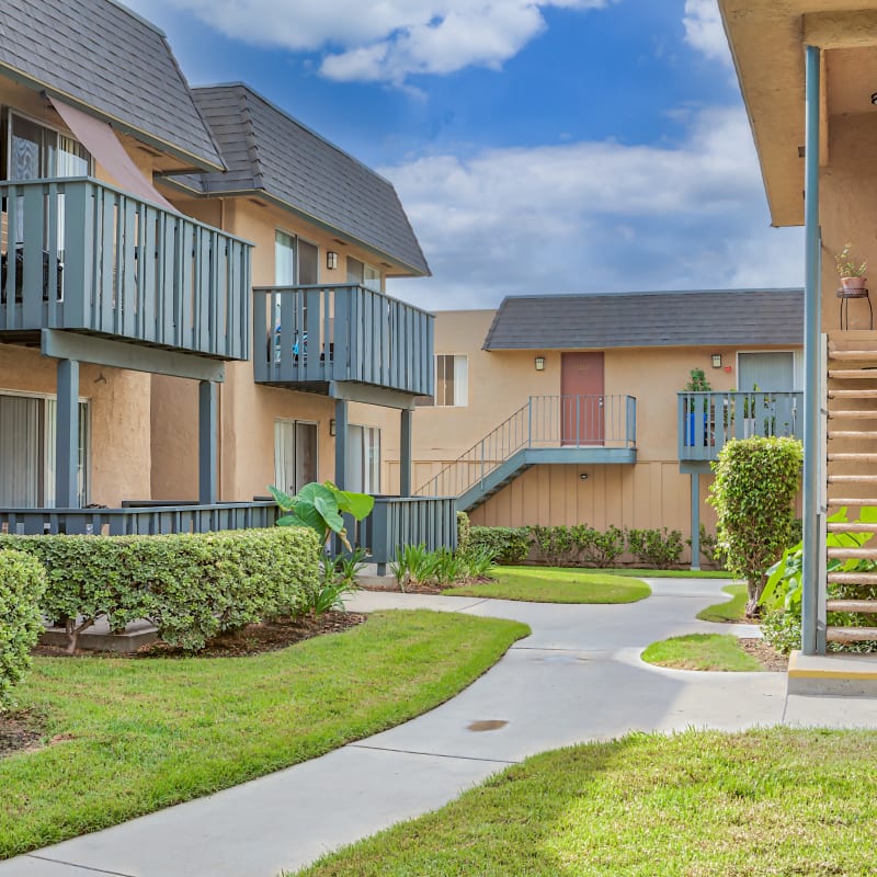 Paved paths to every door at Casa La Palma Apartment Homes in La Palma, California