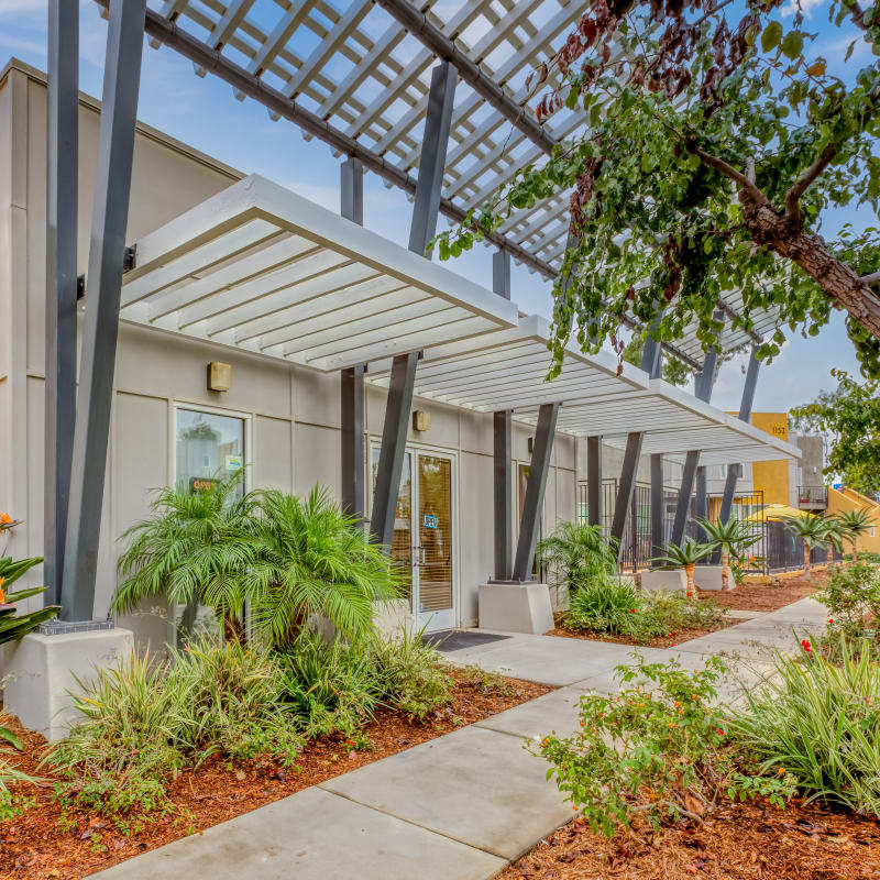 Paved walkway outside at Tesoro Grove Apartments in San Diego, California