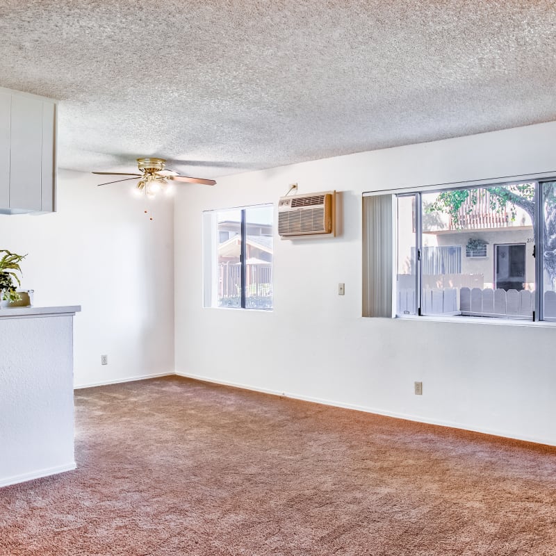 carpeted living space at The Palms Apartments in Rowland Heights, California