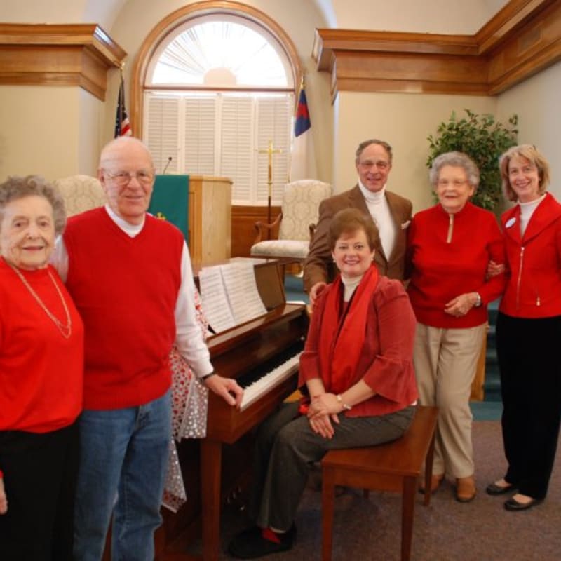 Residents playing the piano at The Columbia Presbyterian Community in Lexington, South Carolina