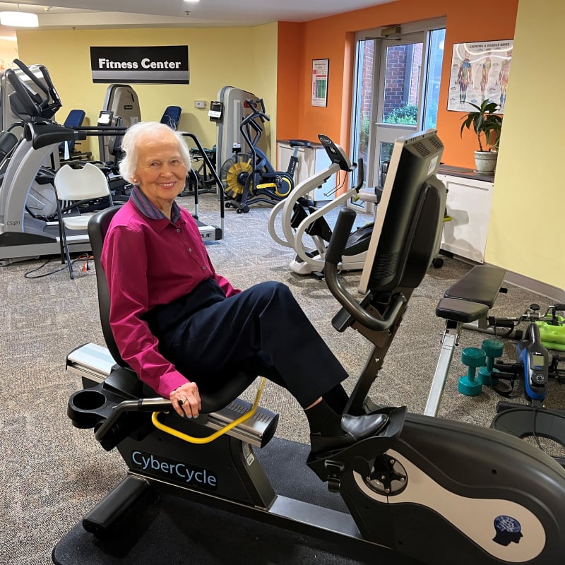 Resident on a seated elliptical at The Columbia Presbyterian Community in Lexington, South Carolina