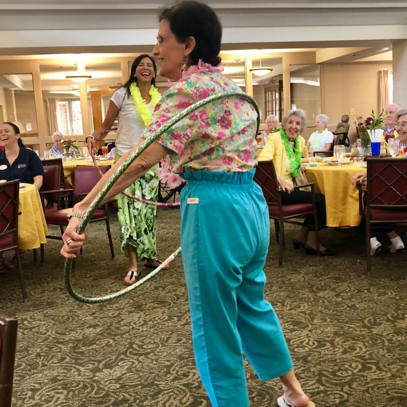 Resident hula-hooping at The Foothills Retirement Community in Easley, South Carolina