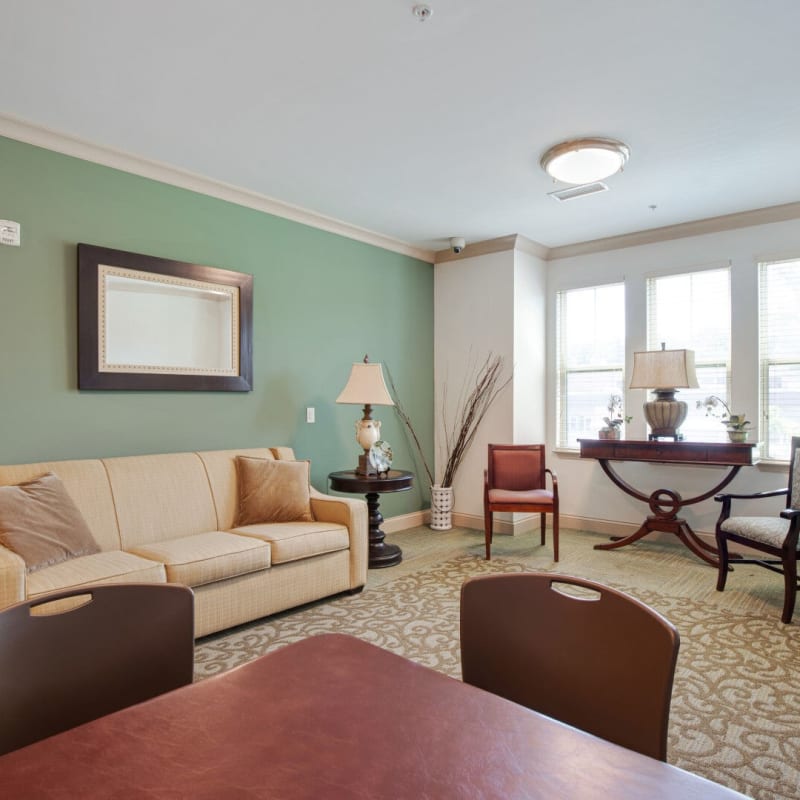 Model living space with wall art at The Retreat at Renaissance in Charlotte, North Carolina