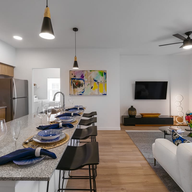 Living room and kitchen at Harmony at Hurley Farms in Tolleson, Arizona